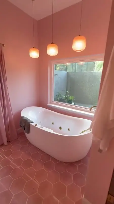Bathroom with a freestanding soaking tub